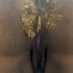 A black woman spreads her ass in close up from below as a soft, mushy load smears out of her ass. She wipes with paper, then shows off her pile on a metal tray at the end. Vertical format video. About a minute.